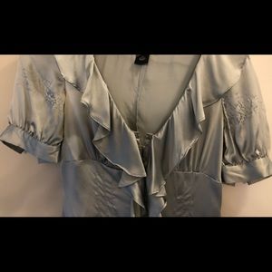 100% silk front closure Extremely feminine blouse